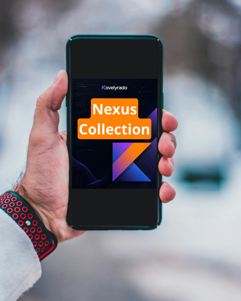 A hand holding a smartphone with a dark screen displaying the text 'Lovelyraso Nexus Collection' in orange and white, with a blurred outdoor snowy background.